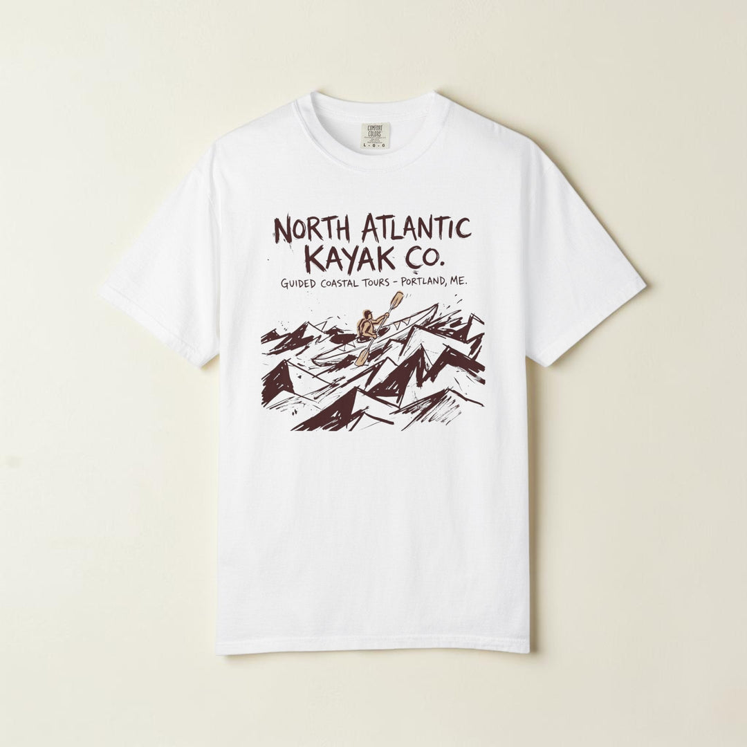 White t-shirt with North Atlantic Kayak Co. graphic design on a white background