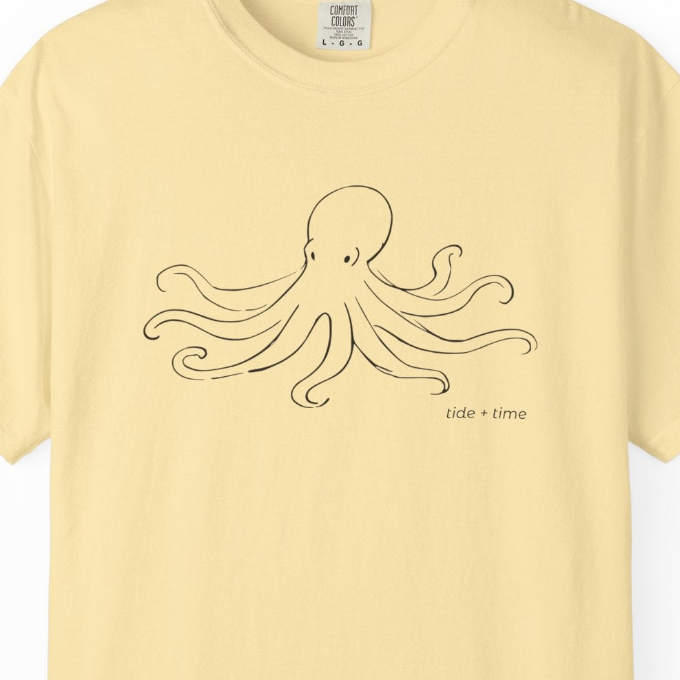 Yellow t-shirt with an octopus design on a white background