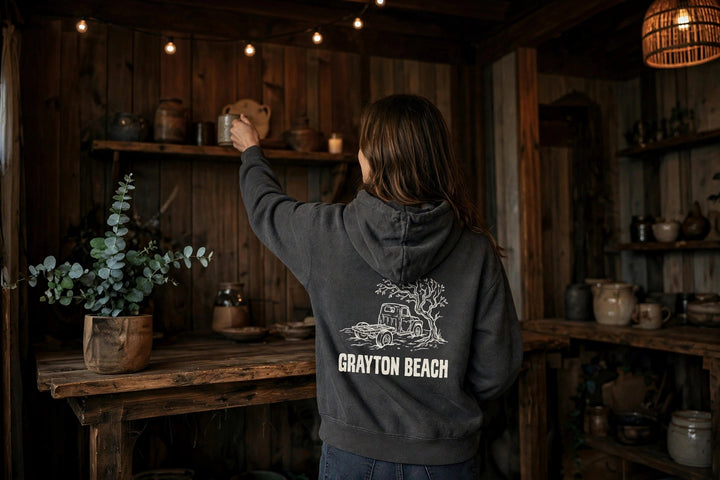 Grayton Beach Florida Hoodie — in the Five Tides room, female back