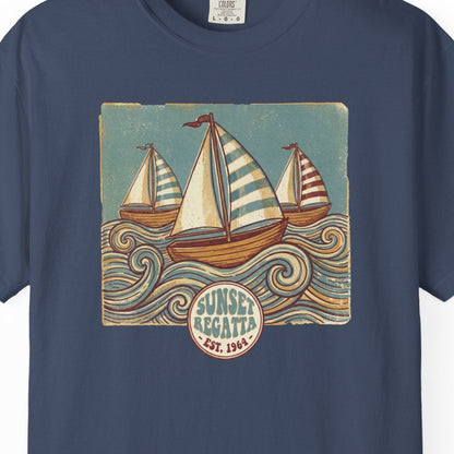 Navy blue t-shirt with sailboat graphic and 'Sunset Yachts' logo on a white background