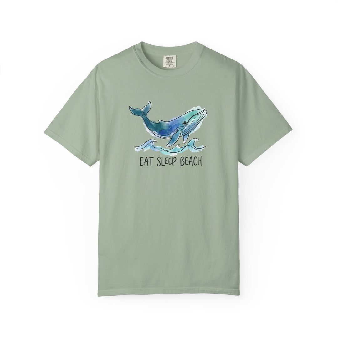 Green t-shirt with a whale graphic and &