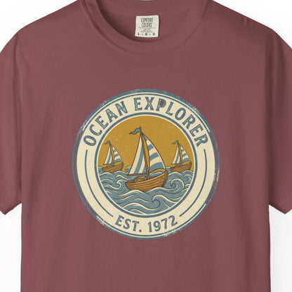 Maroon t-shirt with 'Ocean Explorer' graphic on a white background