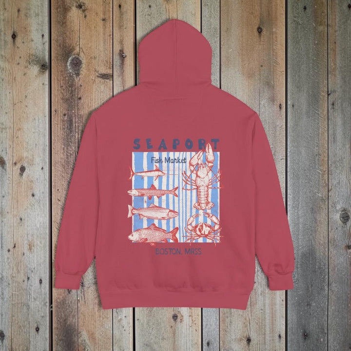 Red hoodie with a graphic of a lobster and fish on the back, on a white background
