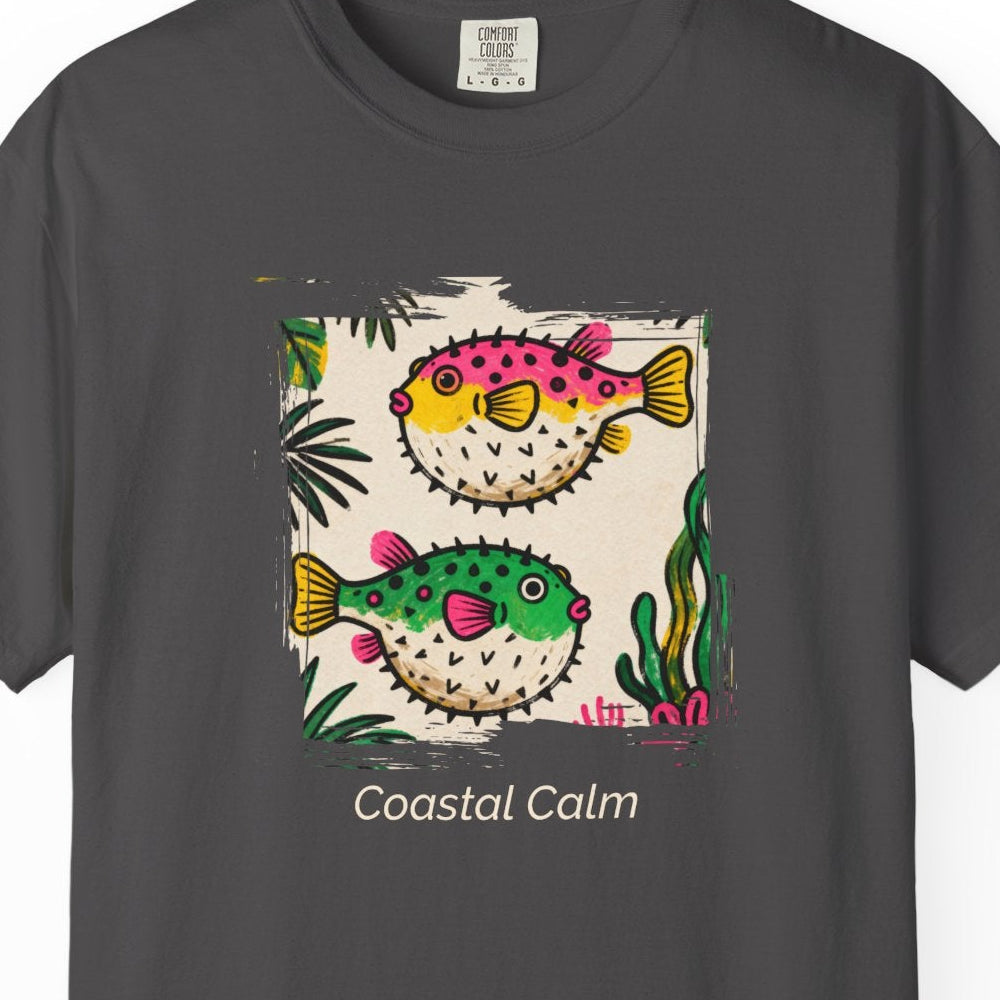 Gray t-shirt with colorful fish design and 'Coastal Calm' text on a white background