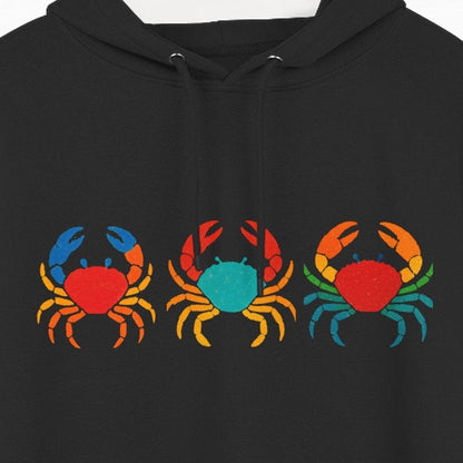 Black hoodie with colorful crab design on a hanger against a white background