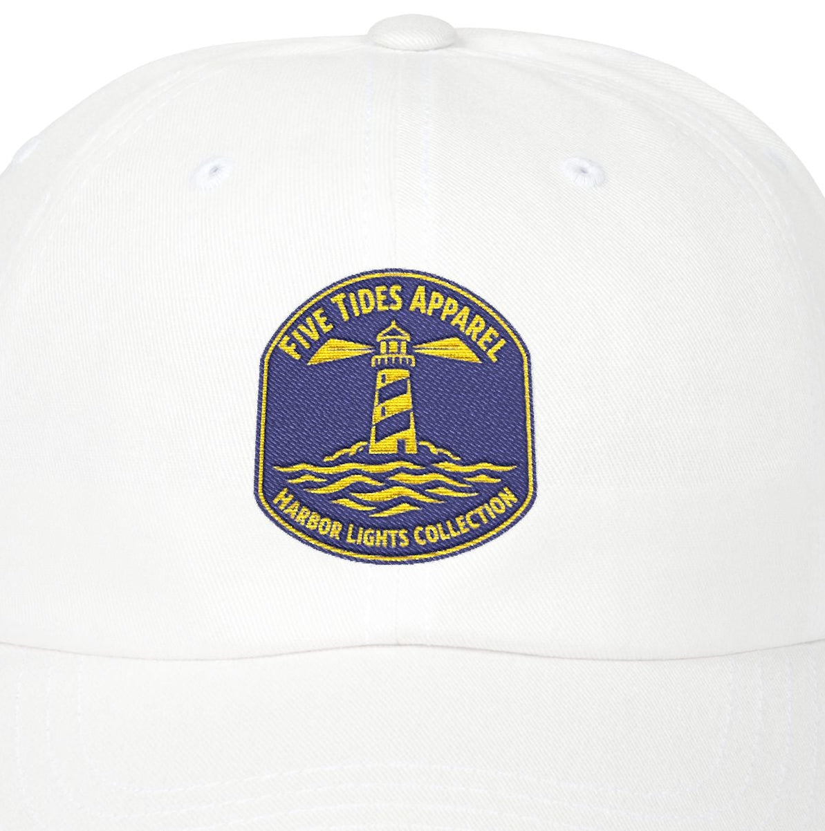 White cap with a lighthouse logo and text on a white background