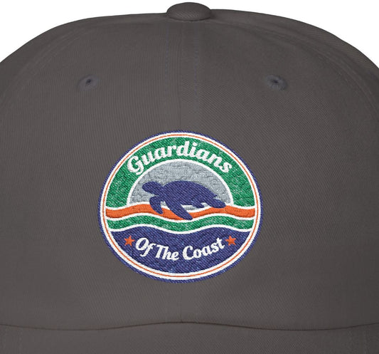 Dark gray cap with 'Guardians of the Coast' logo featuring a turtle on a white background