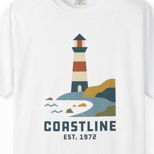 White t-shirt with a lighthouse graphic and 'Coastline Est. 1972' text on a white background