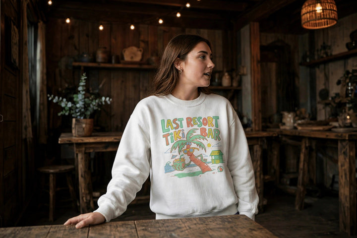 Last Resort Tiki Bar Sweatshirt — in the Five Tides room, female front