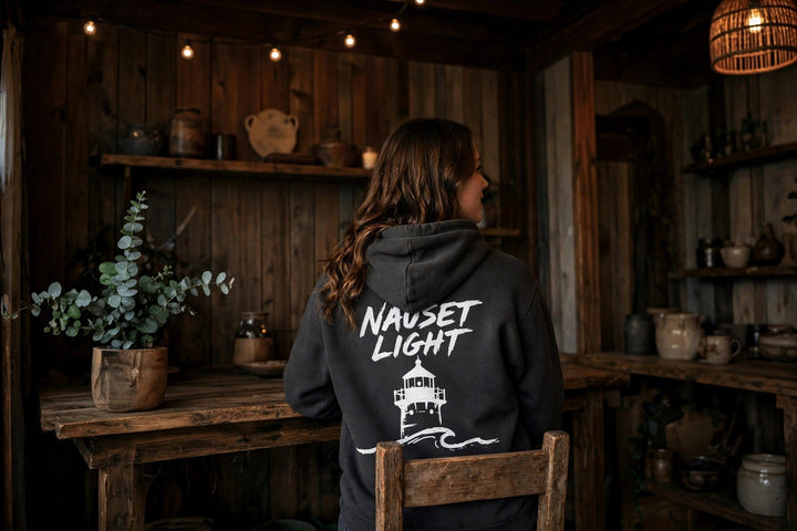 Nauset Light Hoodie — in the Five Tides room, female back