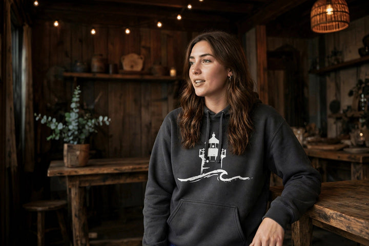 Nauset Light Hoodie — in the Five Tides room, female front