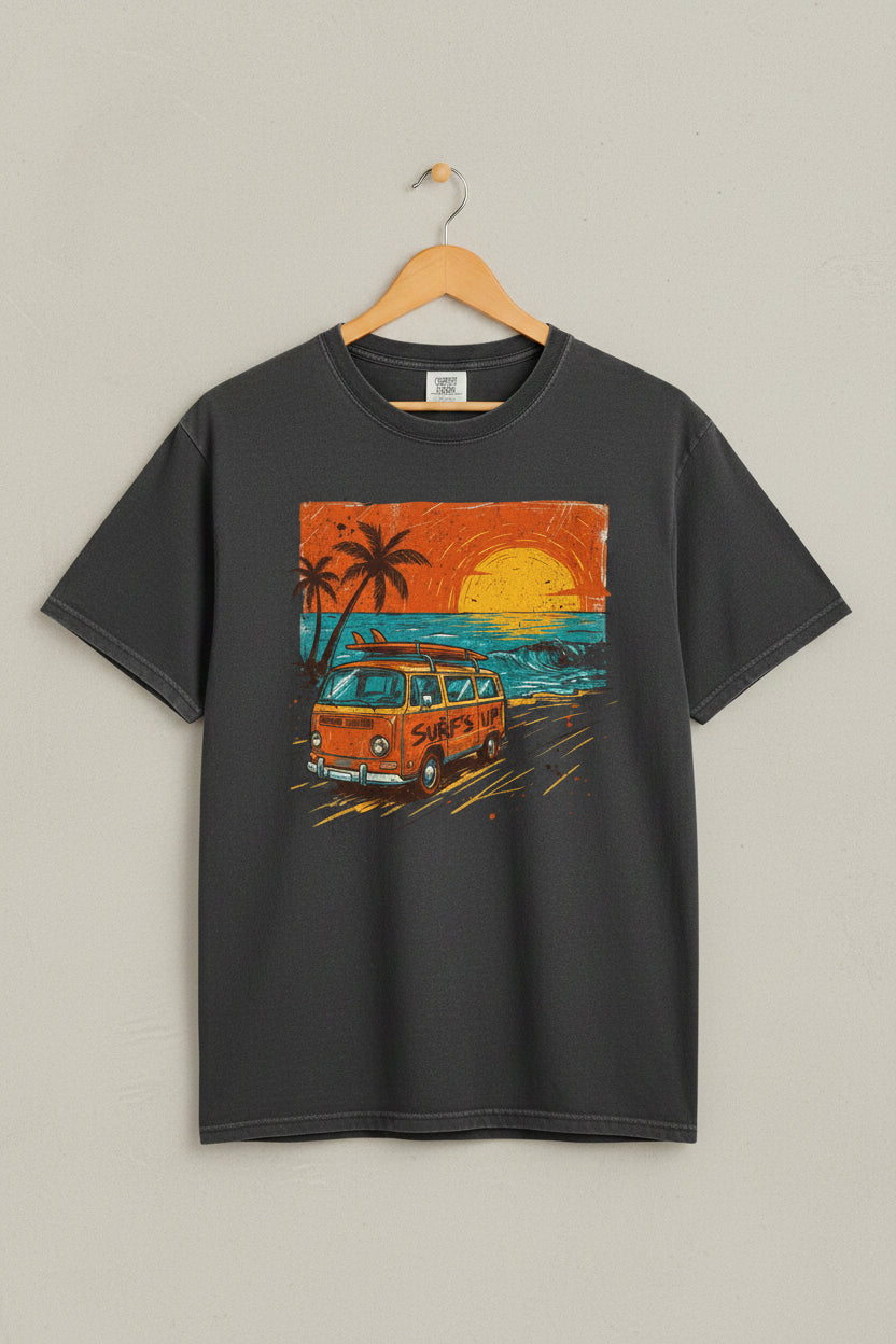 Gray t-shirt with a graphic of a van and palm trees on a beach at sunset.