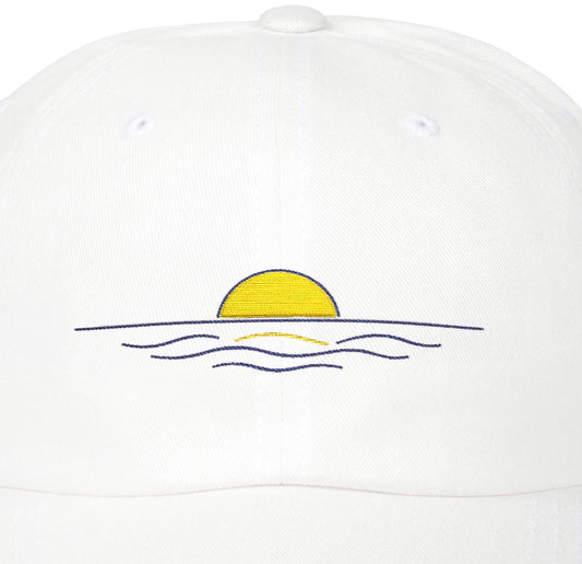 White cap with a sunset design on a white background