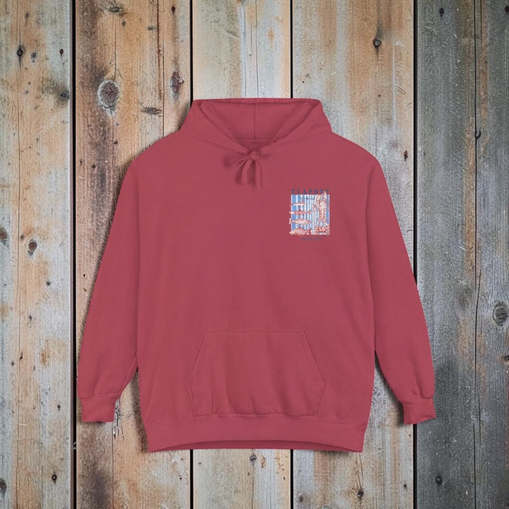 Red hoodie with a colorful graphic on the chest pocket against a white background