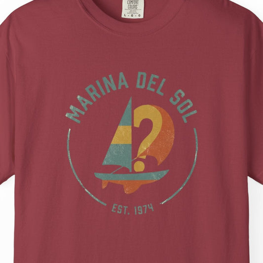 Maroon t-shirt with colorful graphic and text on a white background