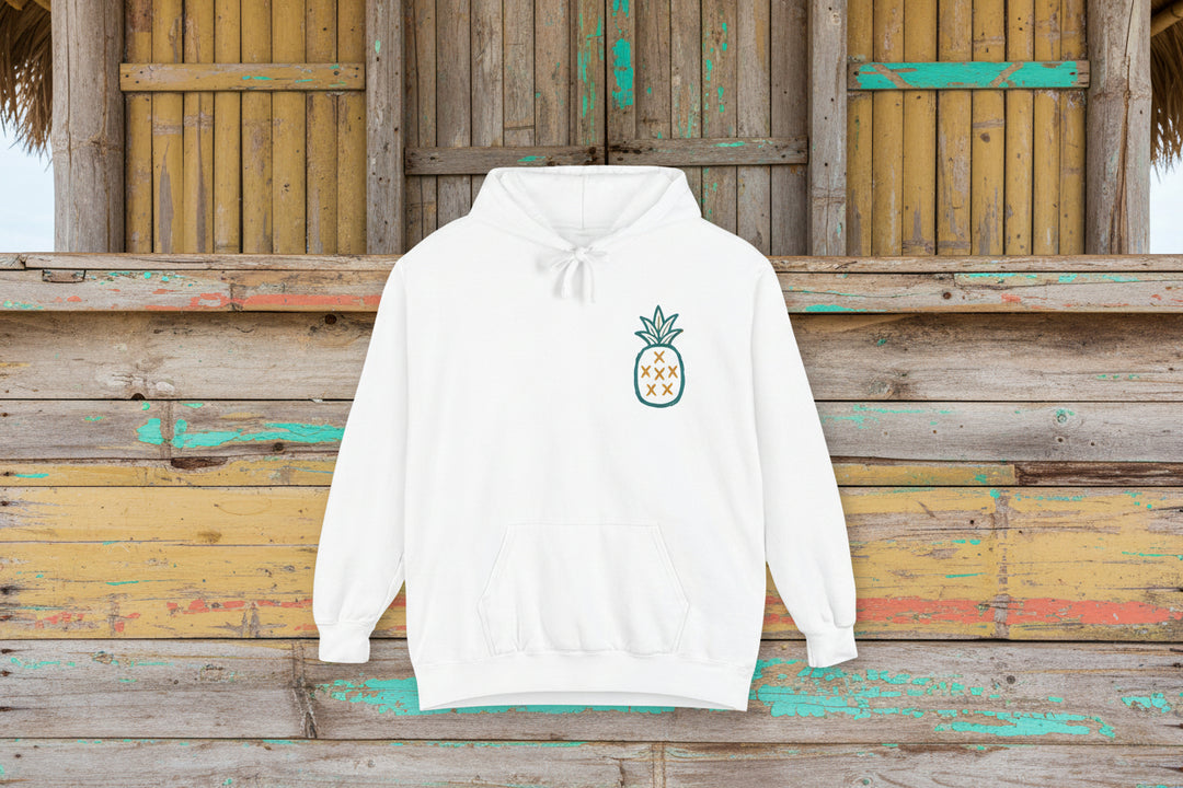 White hoodie with a pineapple design on a white background