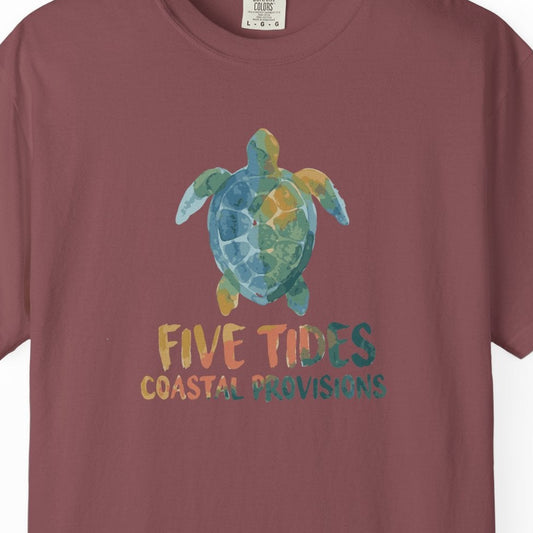Maroon t-shirt with a turtle graphic and text on a white background