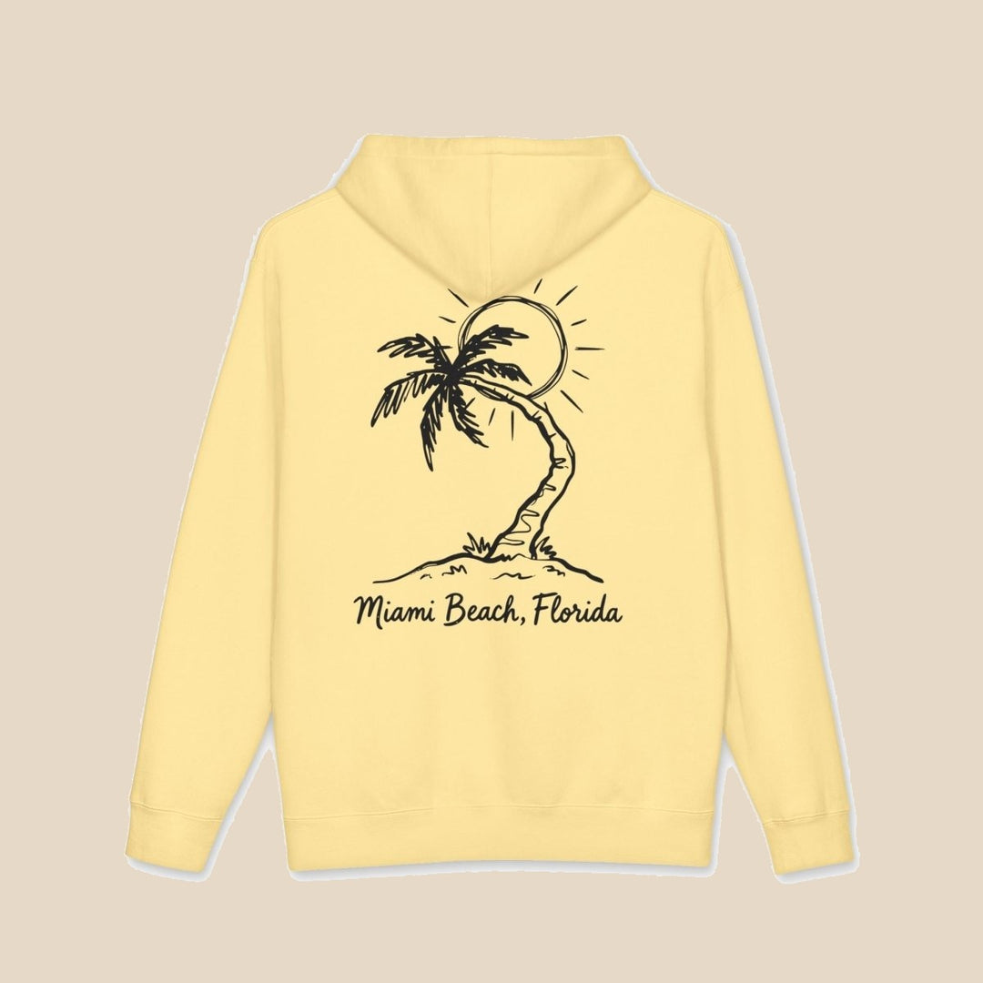 Miami Beach Palm Tree hoodie flat lay, view 1 — coastal sunset graphic pullover by Five Tides Apparel