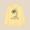 Miami Beach Palm Tree hoodie flat lay, view 1 — coastal sunset graphic pullover by Five Tides Apparel