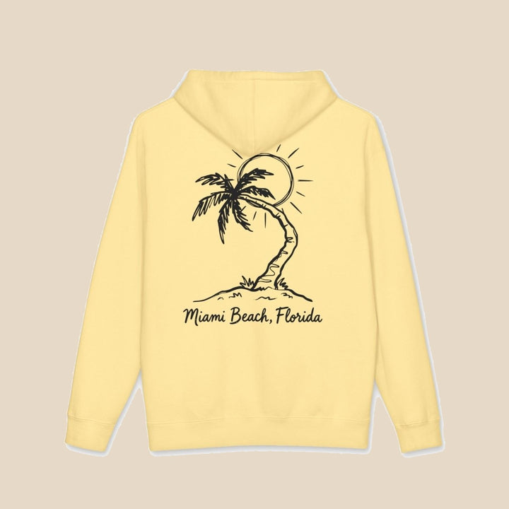 Miami Beach Palm Tree hoodie flat lay, view 1 — coastal sunset graphic pullover by Five Tides Apparel