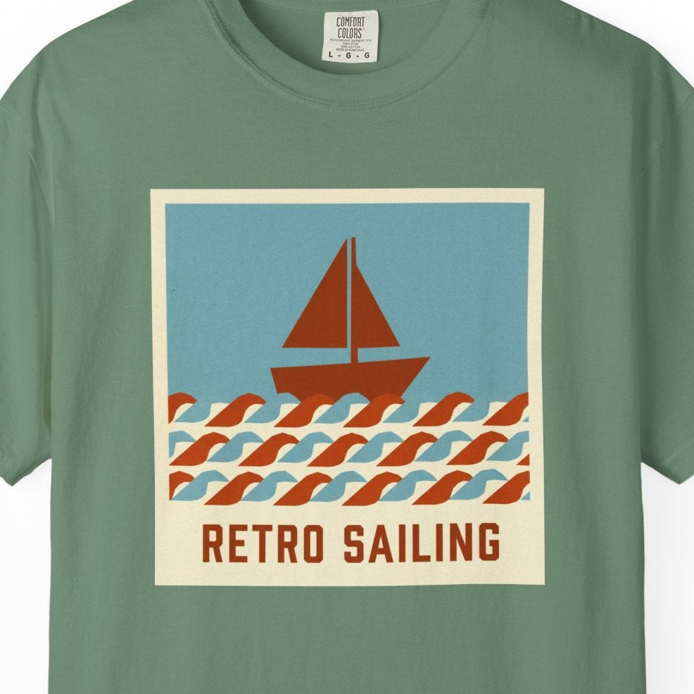 Green t-shirt with a sailboat graphic and 'Retro Sailing' text on a white background