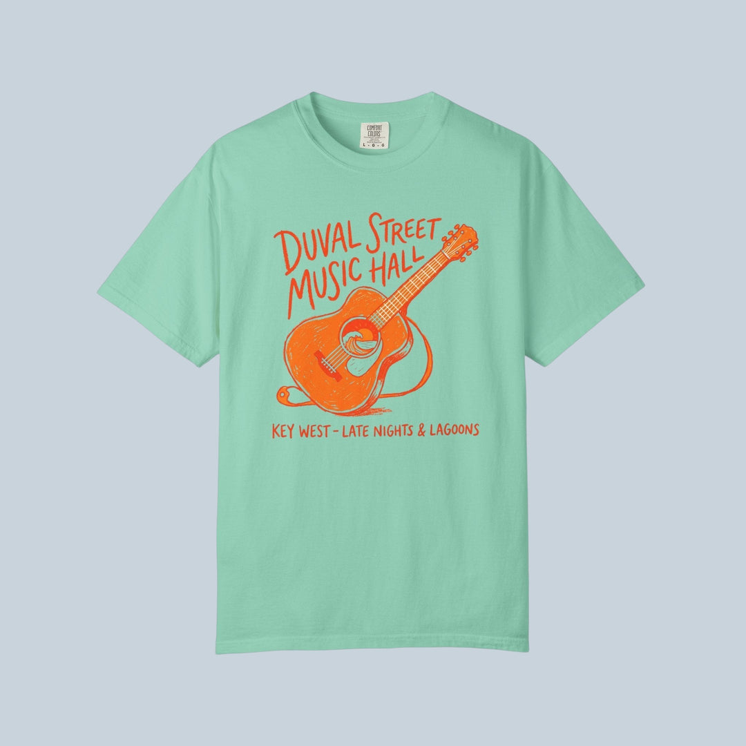 Mint green t-shirt with orange guitar graphic and text on a white background