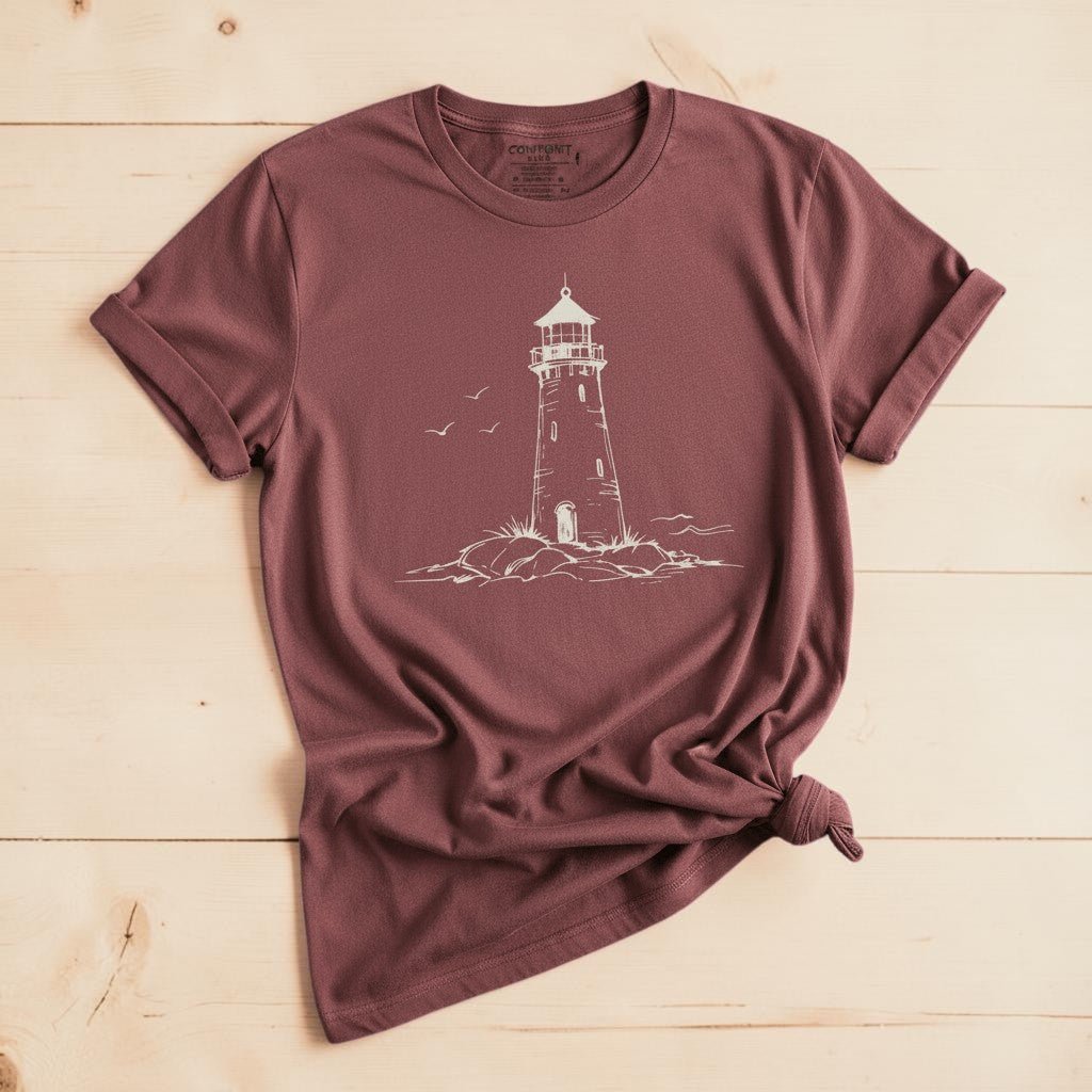 Atlantic Coast Lighthouse Sketch brick garment-dyed tee on weathered wood planks