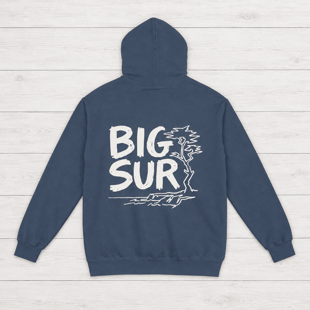 Denim Big Sur hoodie back with white handwritten lettering, coastal trees and cliffs — by Five Tides Apparel