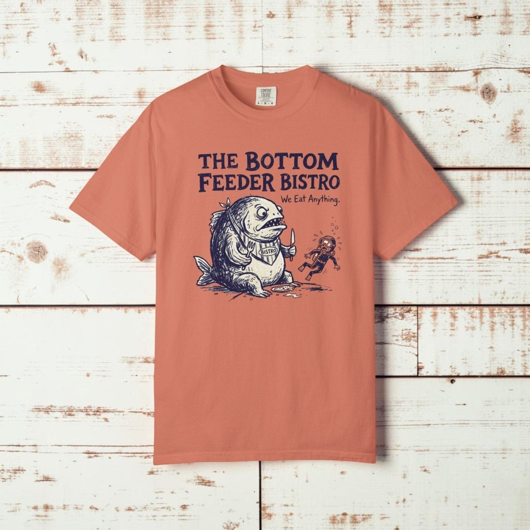 Coral t-shirt with a graphic design and text &