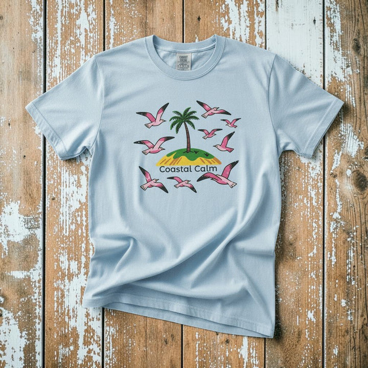 Coastal Calm Palm Tree &amp; Seagulls chambray garment-dyed tee on faded driftwood planks