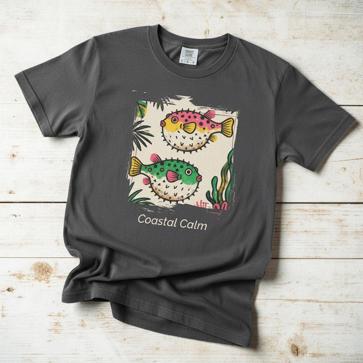 Coastal Calm Pufferfish graphite garment-dyed tee on faded driftwood planks
