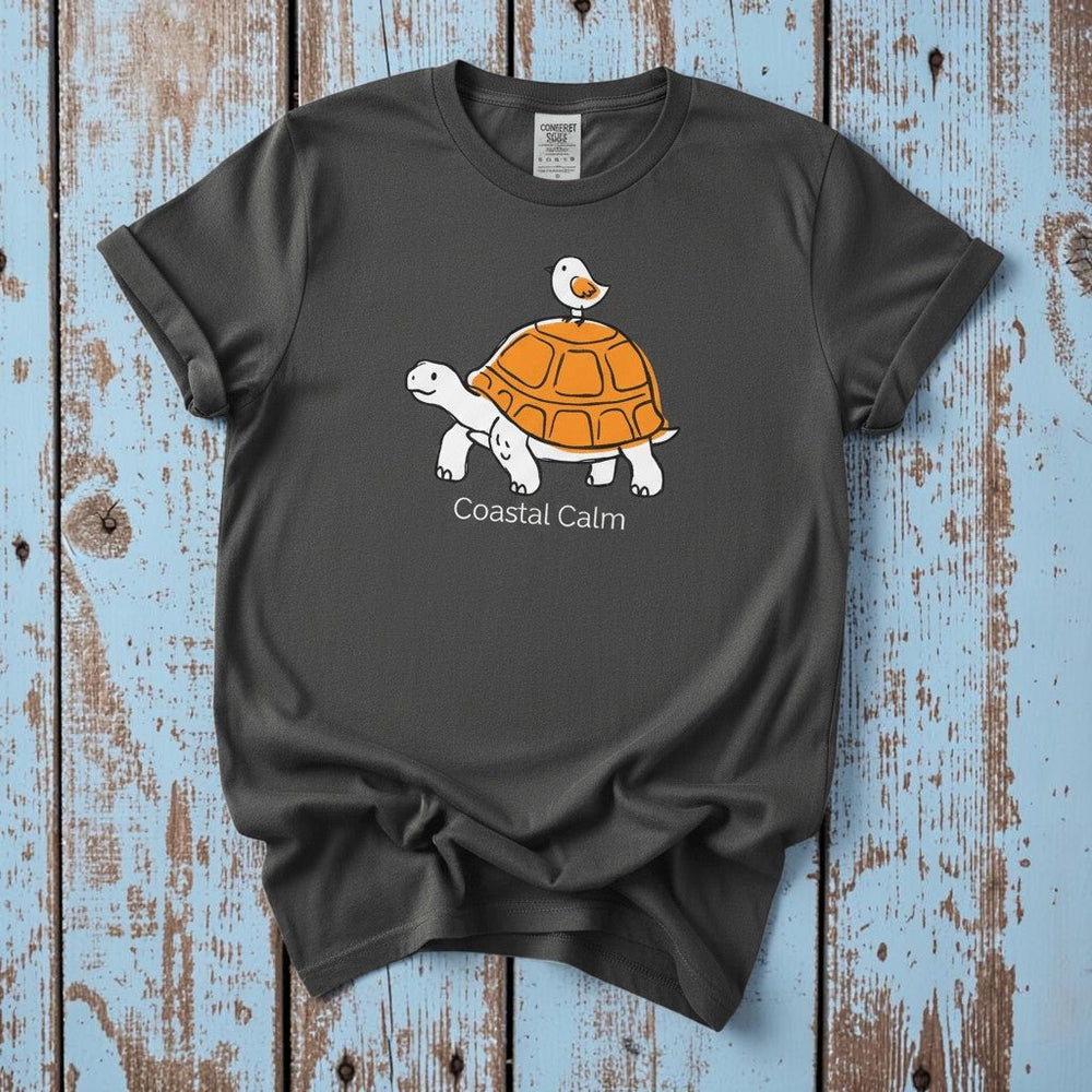 Coastal Calm Turtle Buddies II graphite garment-dyed tee on faded driftwood planks
