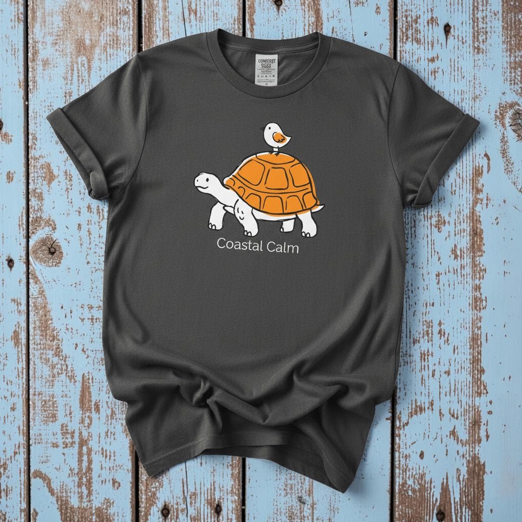 Coastal Calm Turtle Buddies II graphite garment-dyed tee on faded driftwood planks