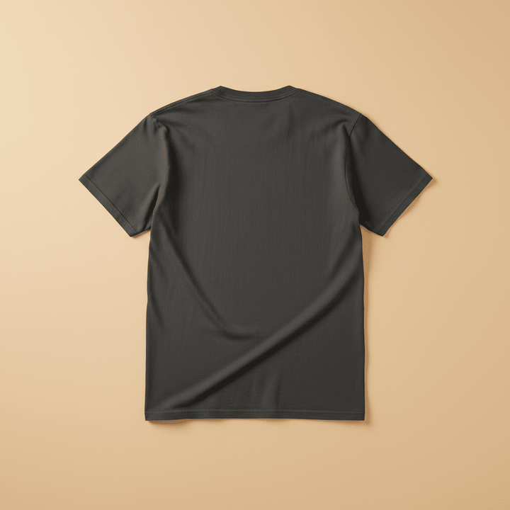 Westcoast Coastal Vibes Tee in Pepper/Charcoal — plain back, warm sand studio background