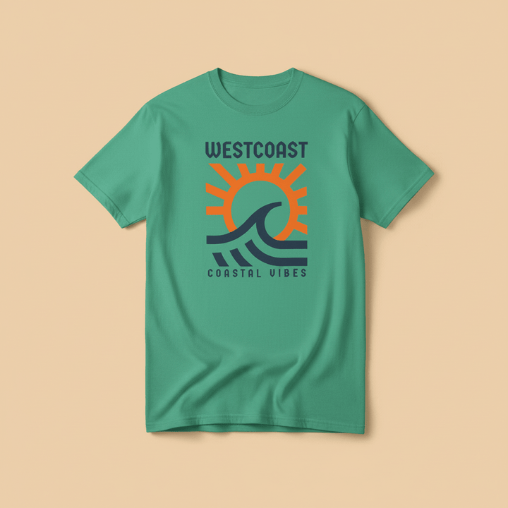 Westcoast Coastal Vibes Tee in Island Green — front graphic, warm sand studio background