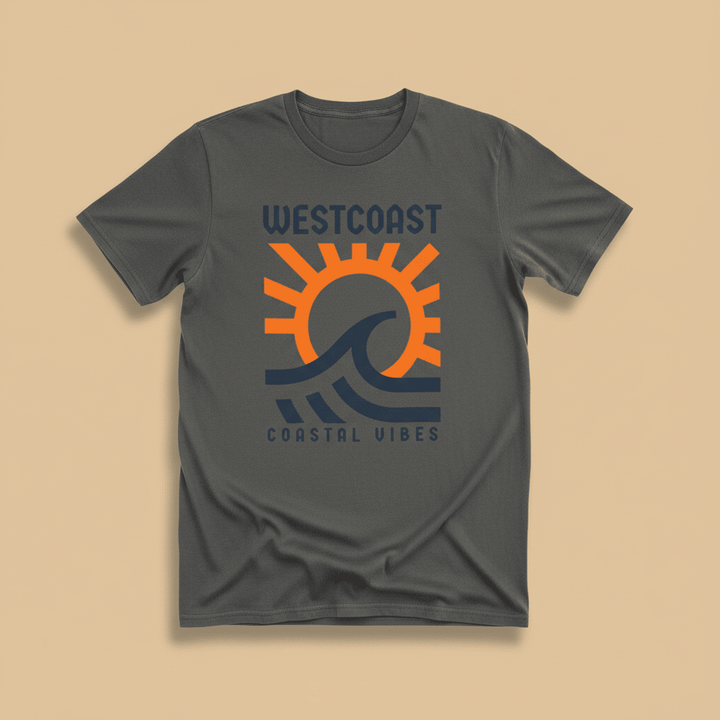 Westcoast Coastal Vibes Tee in Pepper/Charcoal — front graphic, warm sand studio background