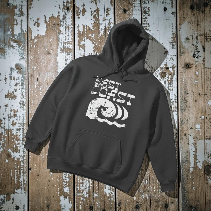 Coastal Vibes Hoodie in Pepper — front graphic, warm sand studio background
