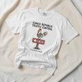 Conch Republic Traffic Control white garment-dyed tee on faded driftwood planks