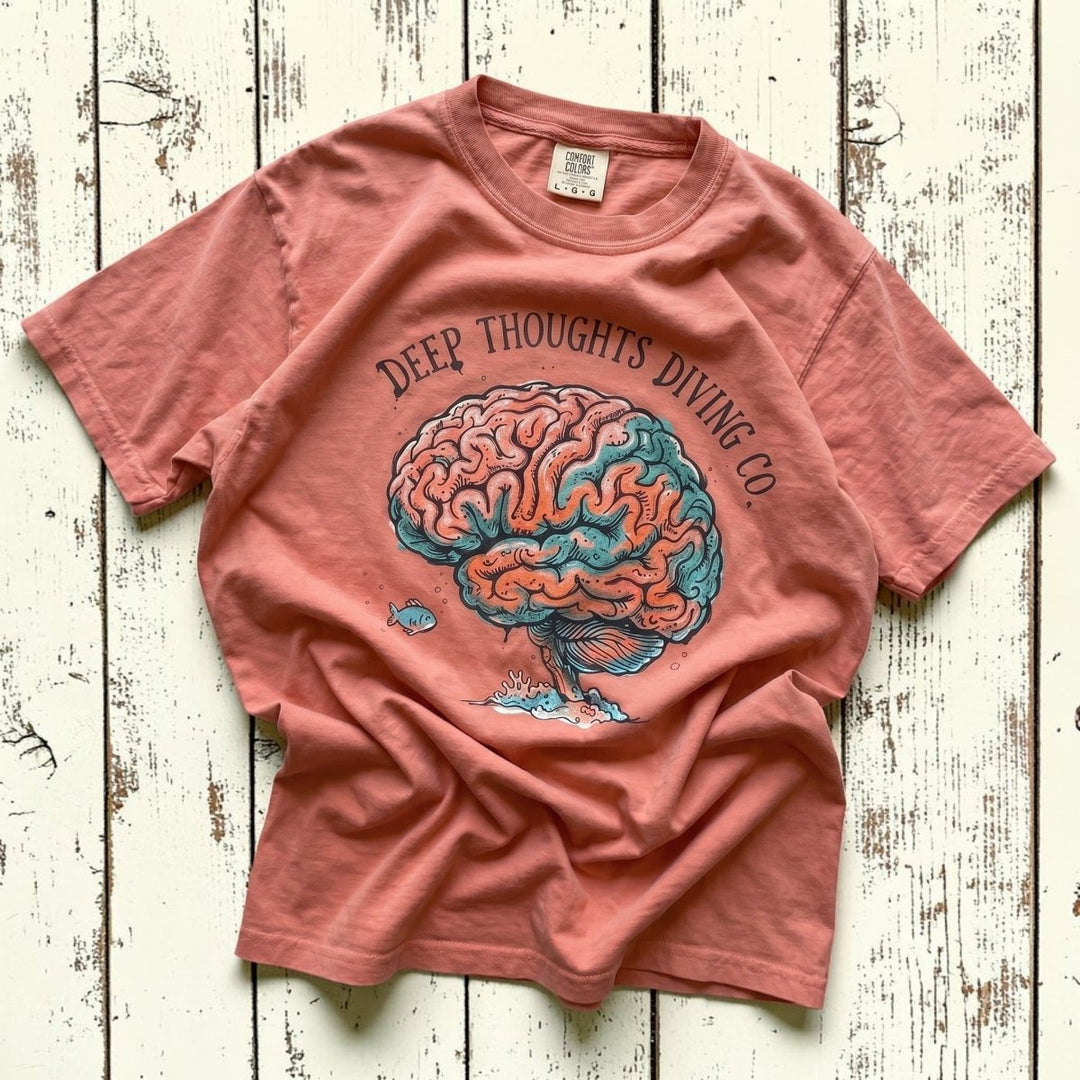 FIVE TIDES APPAREL terracotta garment-dyed cotton t-shirt with a brain coral graphic and Deep Thoughts Diving Co. text
