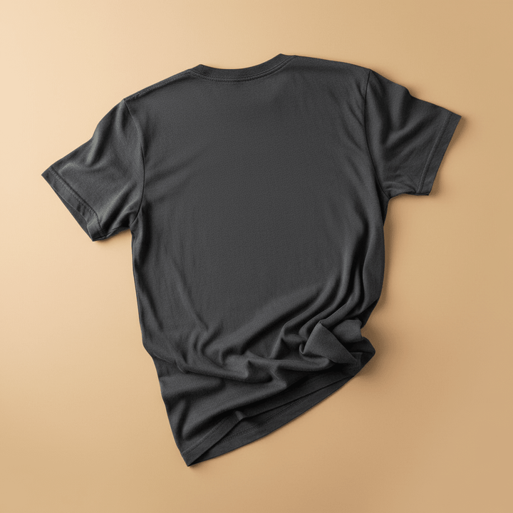 East Coast Tee in Pepper/Charcoal — plain back, warm sand studio background