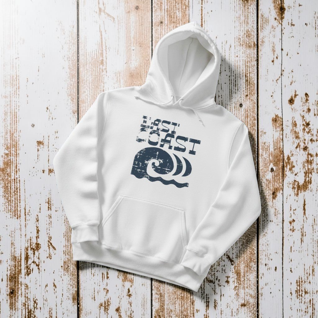 East Coast Hoodie in White — front graphic, warm sand studio background