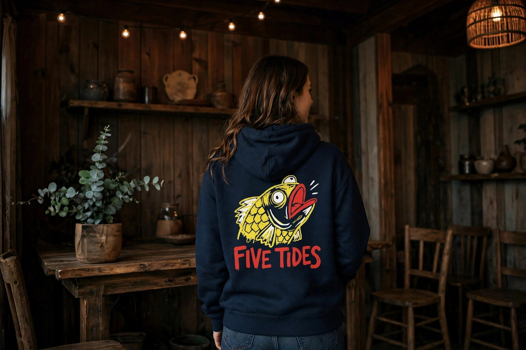 Five Tides Fish Hoodie — in the Five Tides room, female back