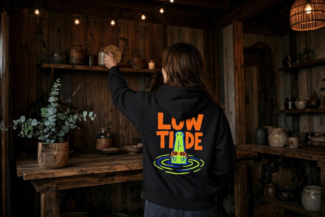 Low Tide Hoodie — in the Five Tides room, female back