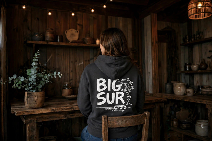 Big Sur Hoodie — in the Five Tides room, female back