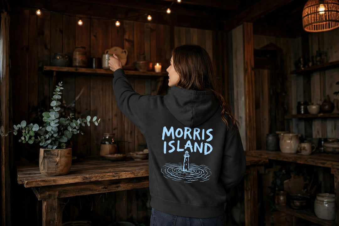 Morris Island Hoodie — in the Five Tides room, female back