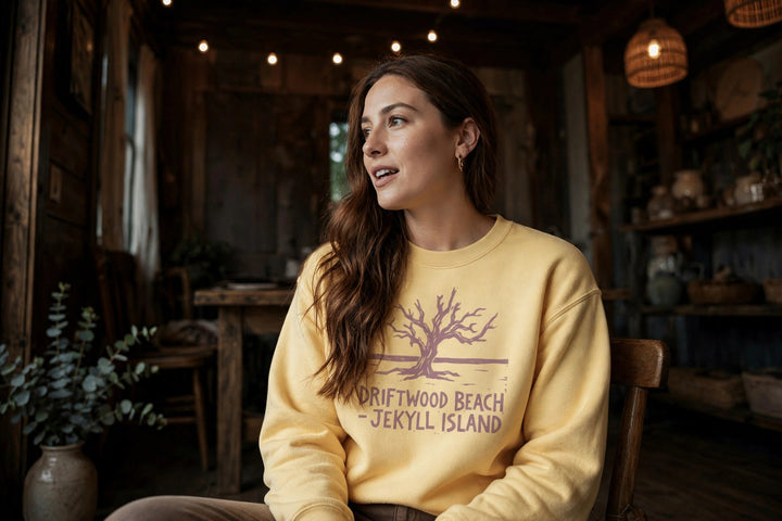 Driftwood Beach Sweatshirt — in the Five Tides room, female front