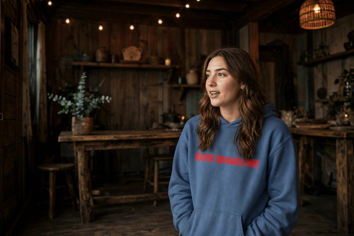 Beaufort Breakwater Diner Hoodie — in the Five Tides room, female front