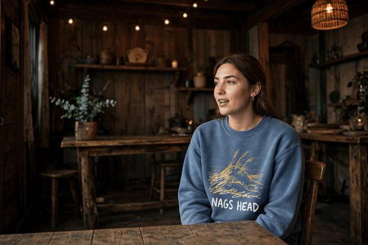 Nags Head Sweatshirt — in the Five Tides room, female front