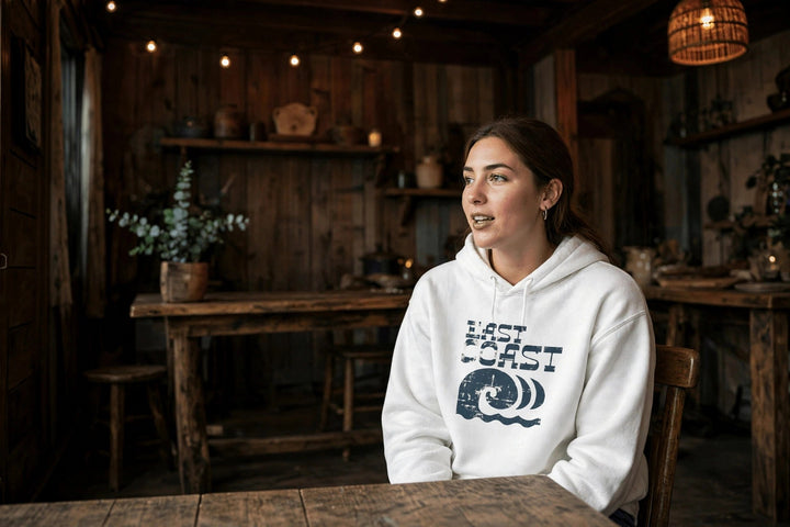 East Coast Waves Hoodie — in the Five Tides room, female front