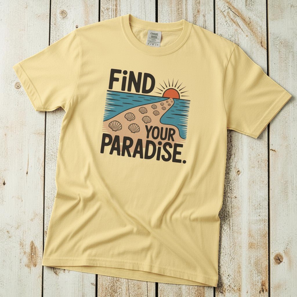 Flat lay - butter yellow Find Your Paradise tee with Comfort Colors label on weathered driftwood planks